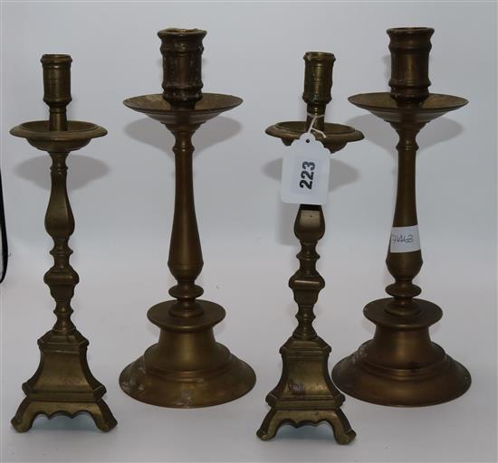 2 pairs of brass candlesticks